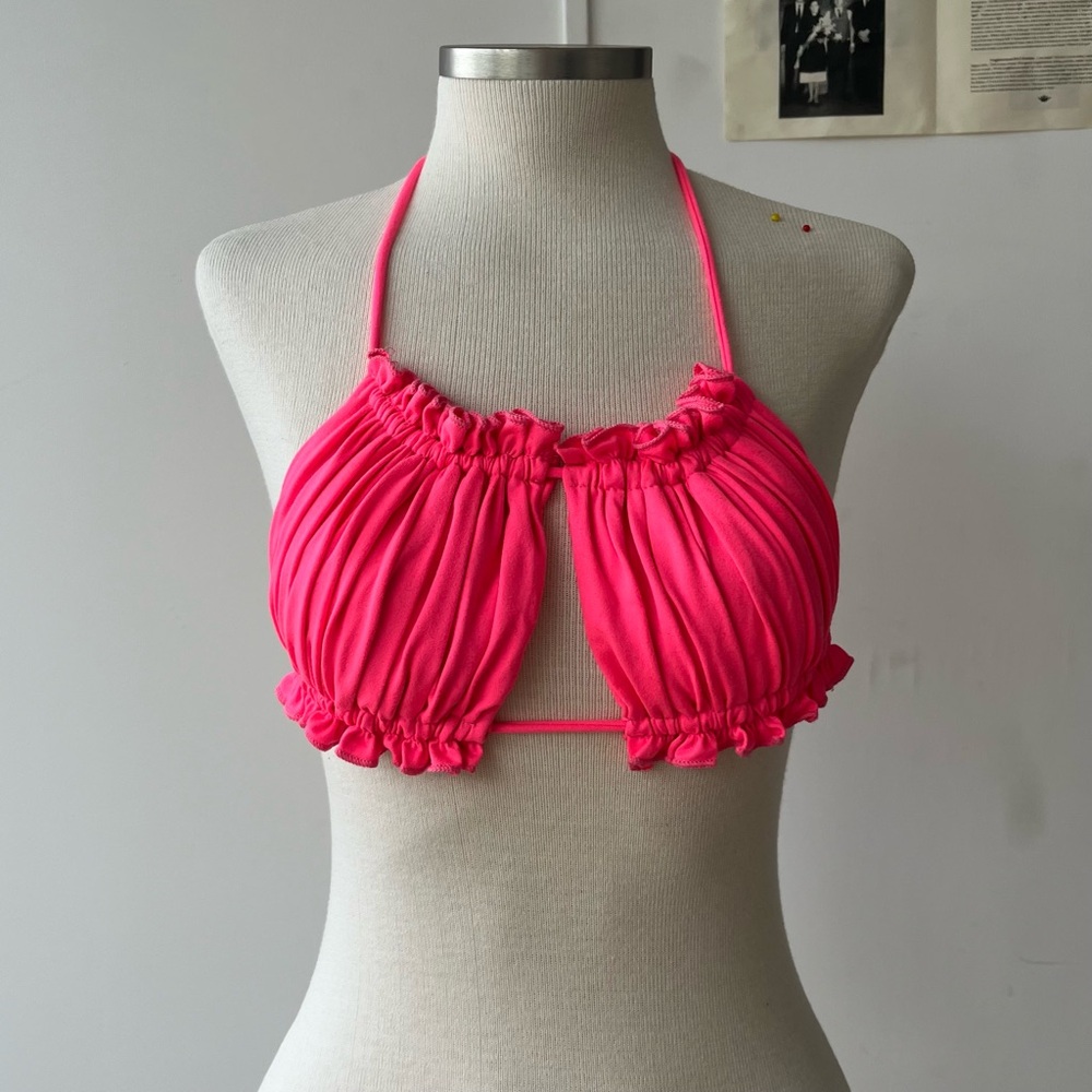 Pink ruffled bikini top with adjustable straps